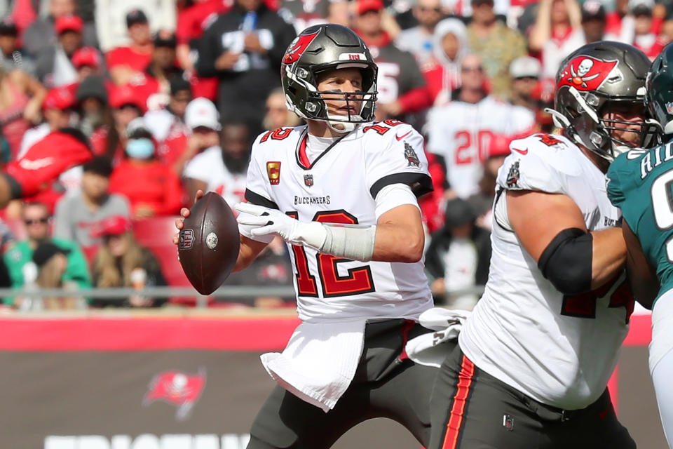 Tampa Bay Buccaneers Quarterback Tom Brady (12) throws a pass during the NFL Wild Card game between the Philadelphia Eagles and the Tampa Bay Buccaneers on January 16, 2022 at Raymond James Stadium in Tampa, Florida. (Photo by Cliff Welch/Icon Sportswire via Getty Images)