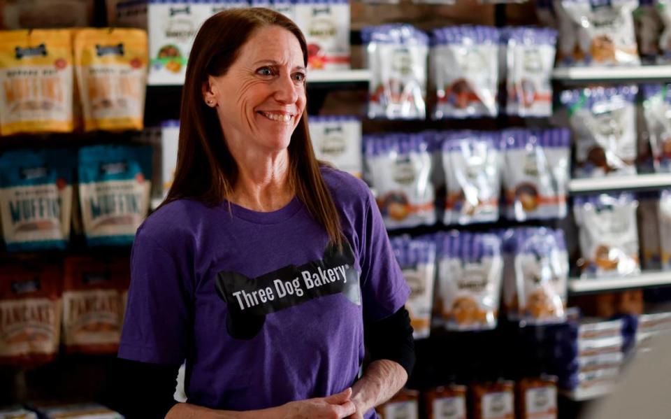 Tracy St. John answers questions about Three Dog Bakery, located at 1106 Broadway in downtown Columbus, Georgia. Franchise owners Tracy and Joey St. John hope to start selling fresh-baked treats and other pet supplies on Feb 15. 01/30/2024