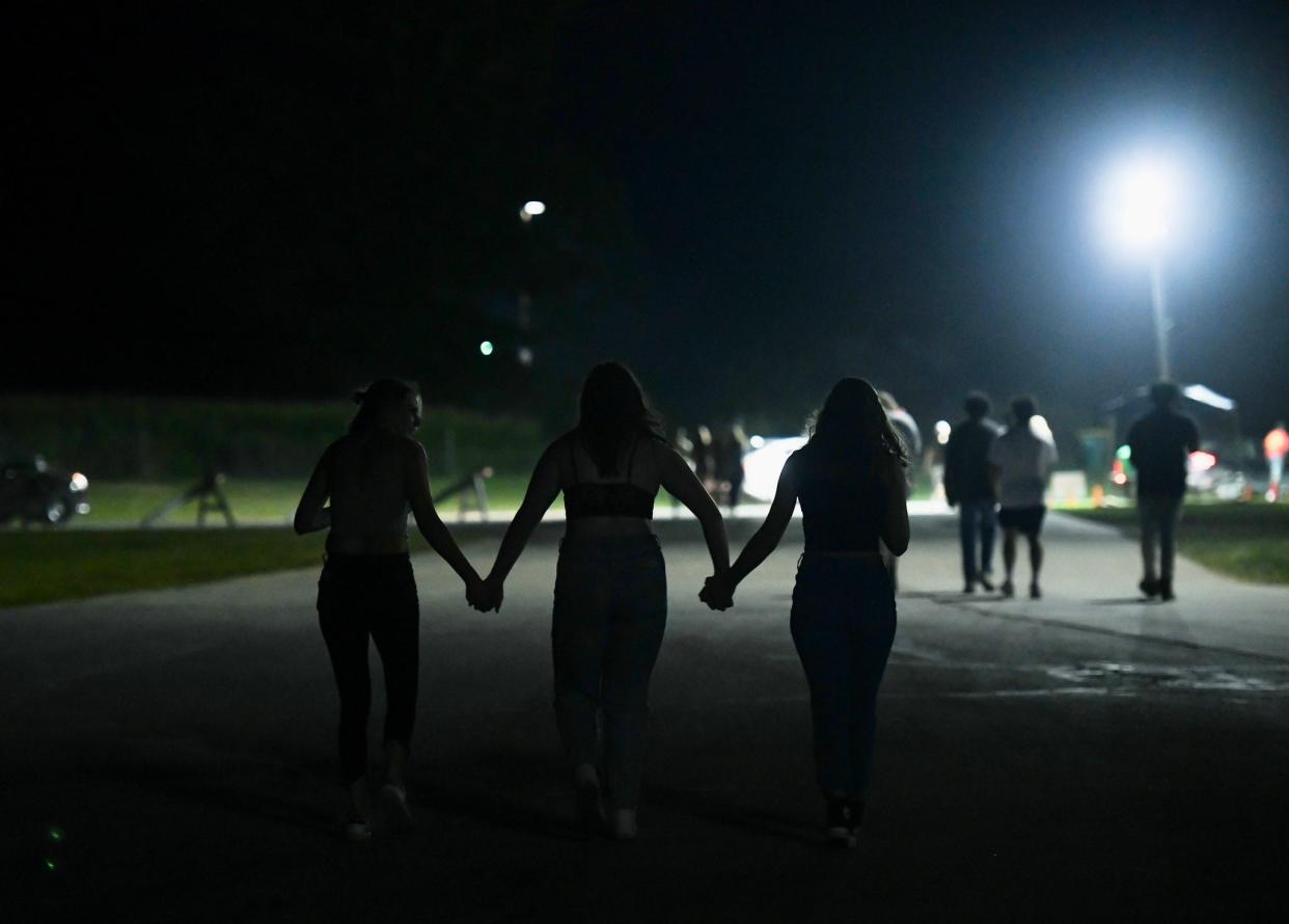Fans leave the Wiz Khalifa concert at Ruoff Music Center on Aug. 26, 2022. The concert ended abruptly after reports of a disturbance in the crowd caused fans to scramble.