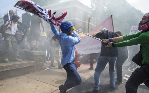 Clashes at Emancipation Park where the White Nationalists are protesting the removal of the Robert E. Lee monument in Charlottesville - Credit:  Anadolu Agency/ Anadolu