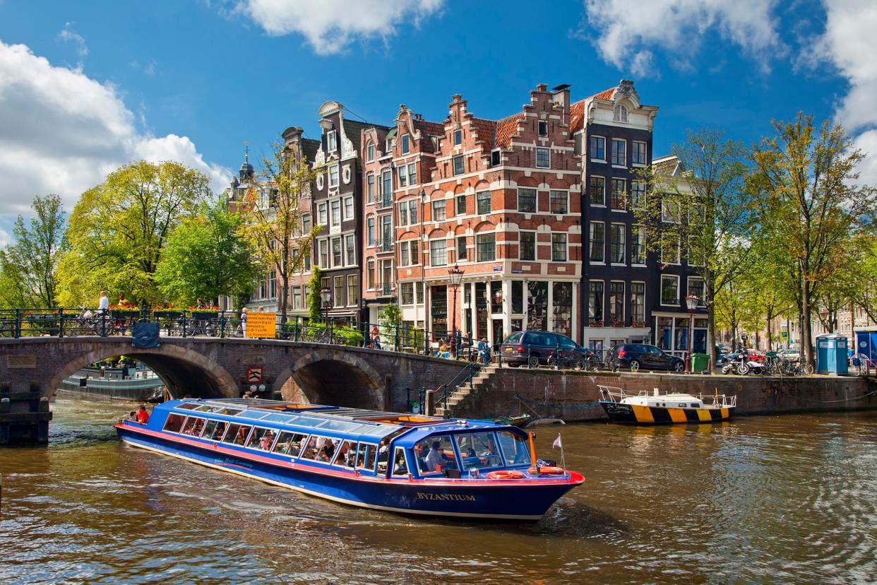 A canal trip seems a predictably touristy thing to do, but a jaunt on a pedalo, or in a glass-topped boat, offers an unrivalled view of Amsterdam’s historic gables. - Photolibrary RM