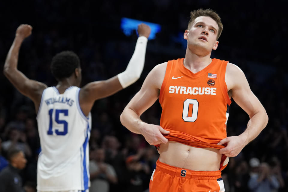 Syracuse's Jimmy Boeheim (0) reacts after the final buzzer of the second half of an NCAA college basketball game during quarterfinals of the Atlantic Coast Conference men's tournament, Thursday, March 10, 2022, in New York. (AP Photo/John Minchillo)