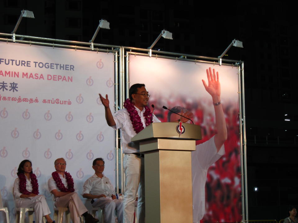 PAP Pioneer SMC candidate Cedric Foo addresses the crowd at Jurong West Stadium. (Yahoo! photo/ Ewen Boey)