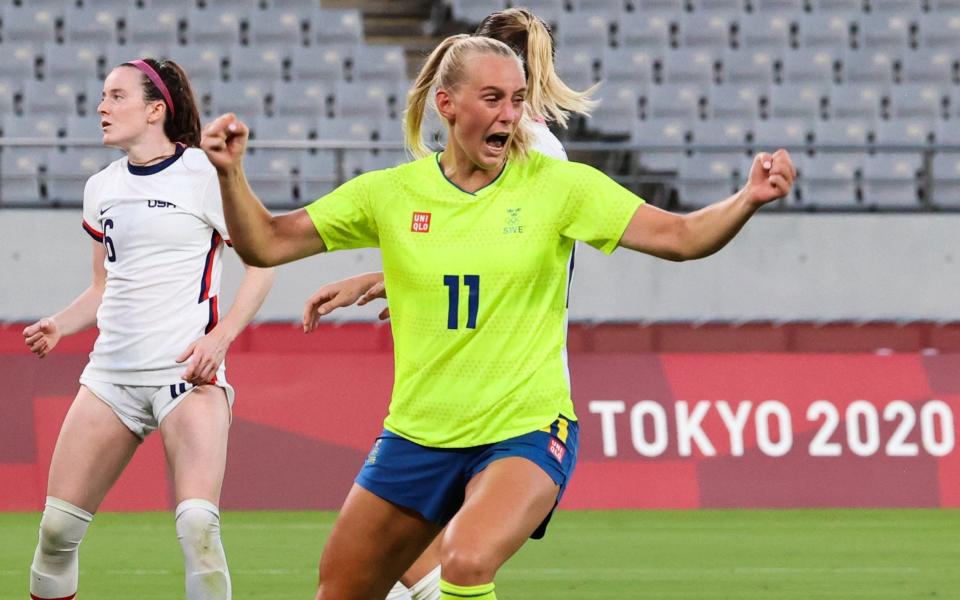 Sweden forward Stina Blackstenius celebrates scoring against USA - AFP