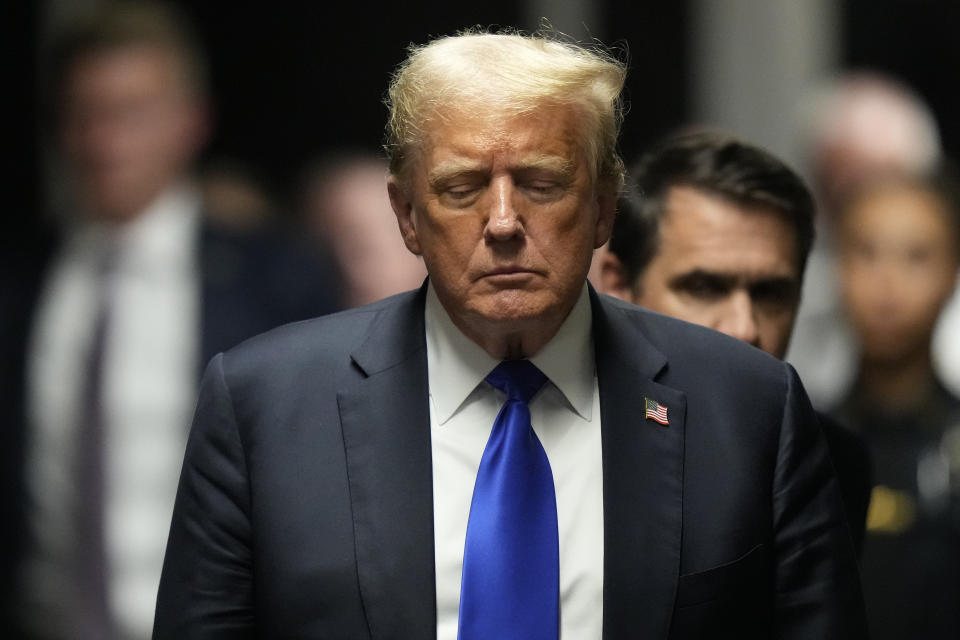 Former President Donald Trump walks to make comments to members of the media after being found guilty on 34 felony counts of falsifying business records in the first degree at Manhattan Criminal Court, Thursday, May 30, 2024, in New York. Donald Trump became the first former president to be convicted of felony crimes as a New York jury found him guilty of 34 felony counts of falsifying business records in a scheme to illegally influence the 2016 election through hush money payments to a porn actor who said the two had sex. (AP Photo/Seth Wenig, Pool)