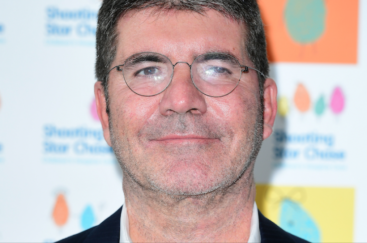 Simon Cowell is planning a charity song for the victims of Grenfell Tower fire.