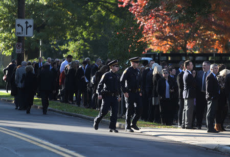 Mourners line up to pay their respects at visitation services for brothers Cecil and David Rosenthal, victims of the Tree of Life Synagogue shooting, at Rodef Shalom Temple in Pittsburgh, Pennsylvania, U.S., October 30, 2018. REUTERS/Cathal McNaughton