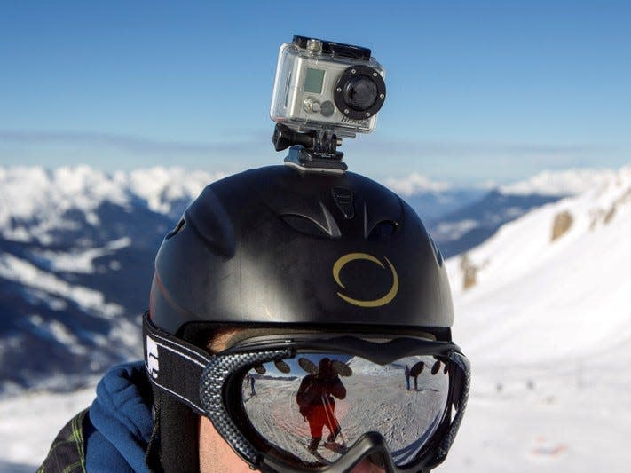 FILE PHOTO: A GoPro camera is seen on a skier's helmet as he rides down the slopes in the ski resort of Meribel, French Alps, January 7, 2014.    REUTERS/Emmanuel Foudrot/File Photo       