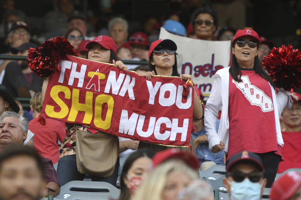 Los Angeles Angels' fans holds a sign thanking pitcher Shohei Ohtani during the Angels' final home game against the Seattle Mariners, Sunday, Sept. 26, 2021, in Anaheim, Calif. The Mariners won 5-1. (AP Photo/Michael Owen Baker)