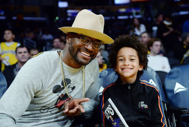 Kevork S. Djansezian/Getty Images Taye Diggs and son Walker in 2021