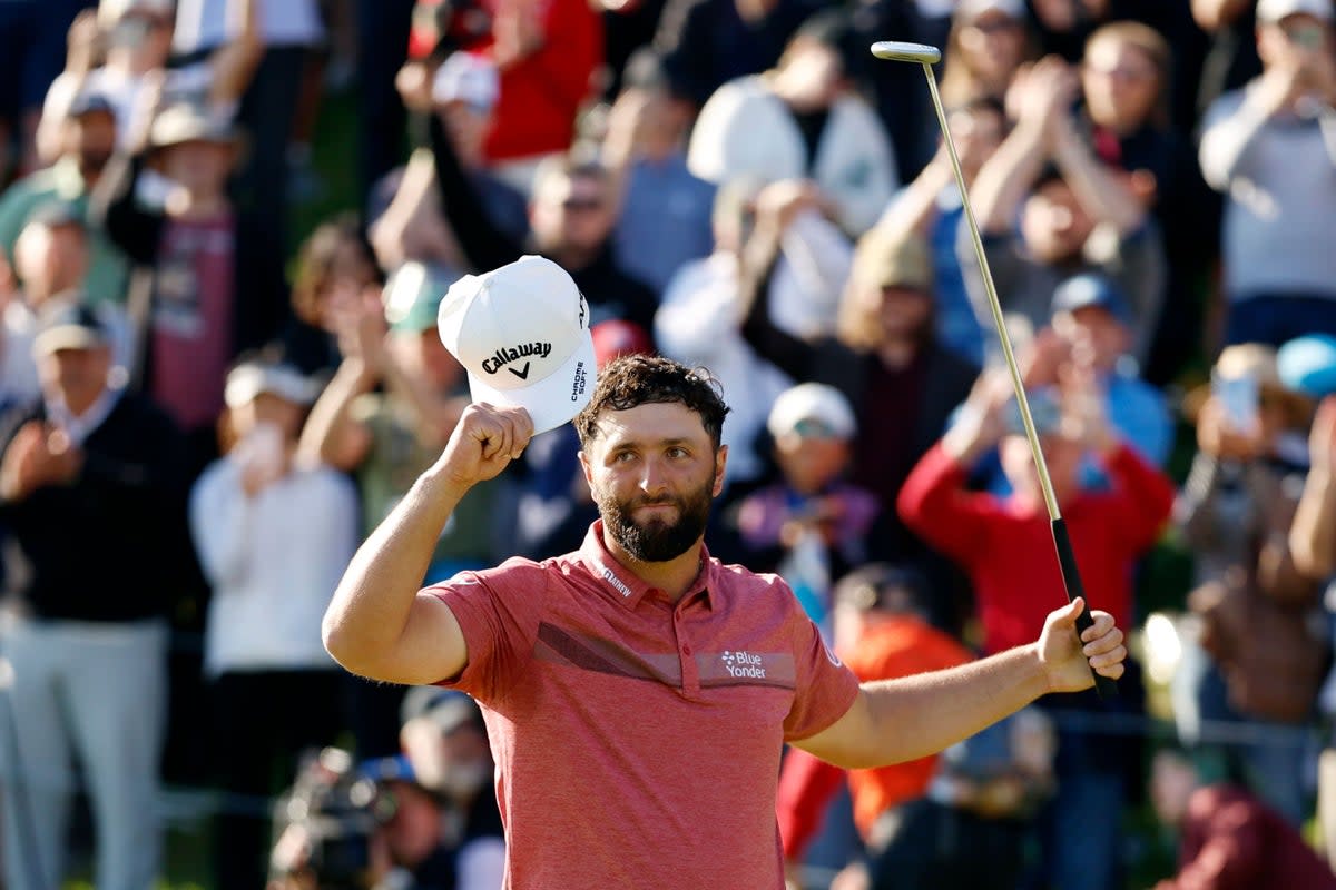 Jon Rahm celebrates on the 18th green after winning the Genesis Invitational (Ryan Kang/AP) (AP)