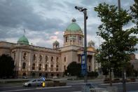 A surveillance camera is seen in front of the Serbian Parliament building in Belgrade