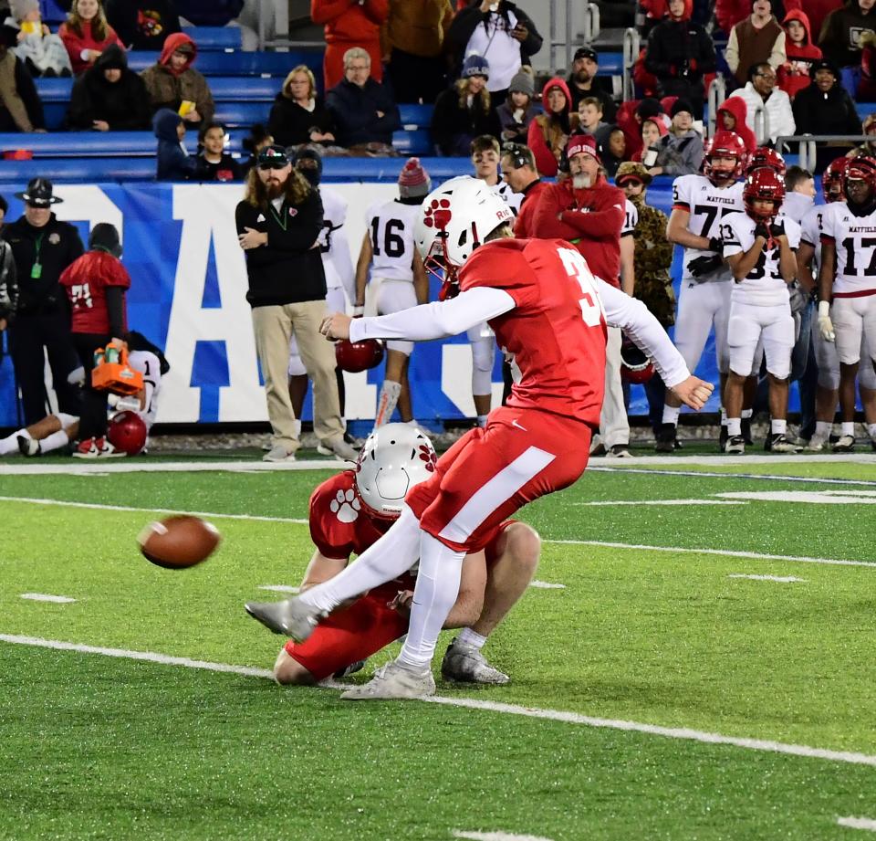 Matthew Kappes lifts Beechwood over Mayfield with his successful PAT for the Tigers in the KHSAA Class 2A state title game between Beechwood and Mayfield high schools Friday, Dec. 2, 2022.