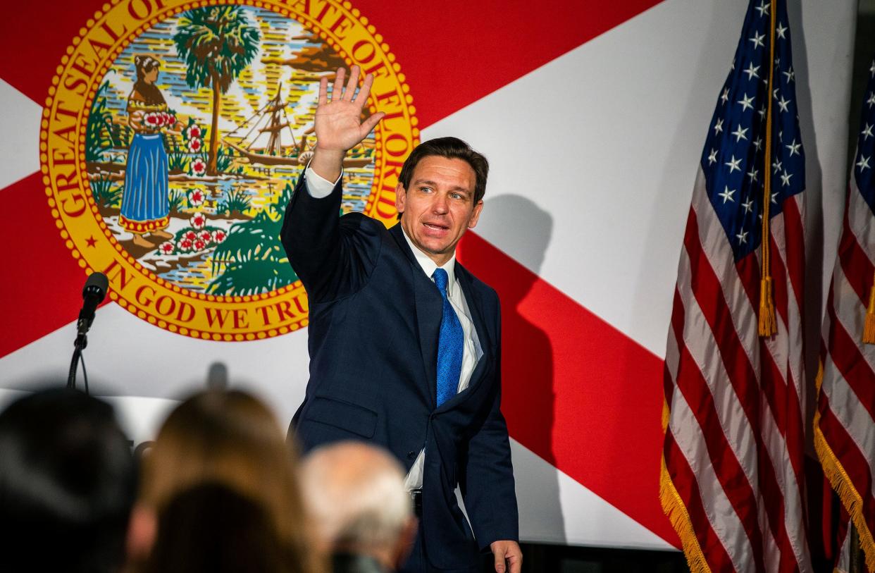 Florida Governor Ron DeSantis waves to supporters after a visit at the Fire restaurant in Winter Haven Fl  Thursday March 16,2023. Ernst Peters/The Ledger