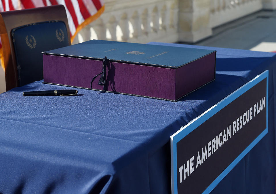 The Bill Enrollment for the American Rescue Plan Act before its signing ceremony, at the U.S. Capitol on March 10.<span class="copyright">Olivier Douliery—AFP/Getty Images</span>