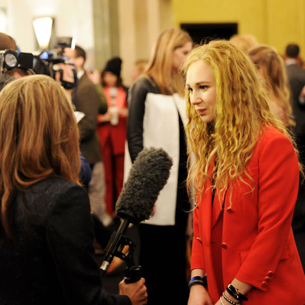 Juno Temple is interviewed backstage at the Mulberry show © Getty