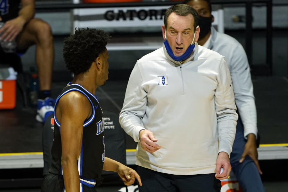 FILE - In this Feb. 1, 2021, file photo, Duke head coach Mike Krzyzewski talks to guard Jeremy Roach (3) during the second half of an NCAA college basketball game against Miami in Coral Gables, Fla. Krzyzewski's Blue Devils host rival North Carolina on Saturday, Feb. 6, 2021, with it marking the first meeting with both teams unranked since 1960. (AP Photo/Marta Lavandier, File)