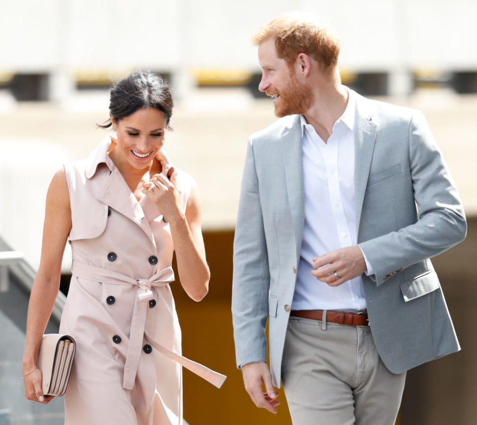 Unlike his brother, Prince Harry chooses to wear a wedding band, pictured with wife Meghan in 2018. (Getty Images)