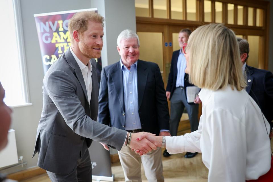 Prince Harry meets with presenter and journalistLouise Minchin during The Invictus Games Foundation Conversation on Tuesday (Getty Images for The Invictus Ga)