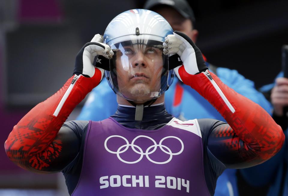 Russia's Albert Demchenko prepares for the start during the men's luge training at the Sanki sliding center in Rosa Khutor, a venue for the Sochi 2014 Winter Olympics near Sochi February 5, 2014. REUTERS/Fabrizio Bensch (RUSSIA - Tags: SPORT LUGE OLYMPICS)