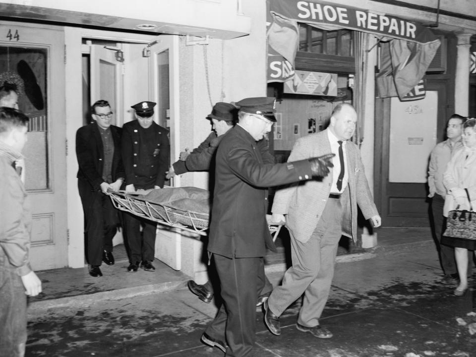 Mary Sullivan’s body being removed from her home in 1964.