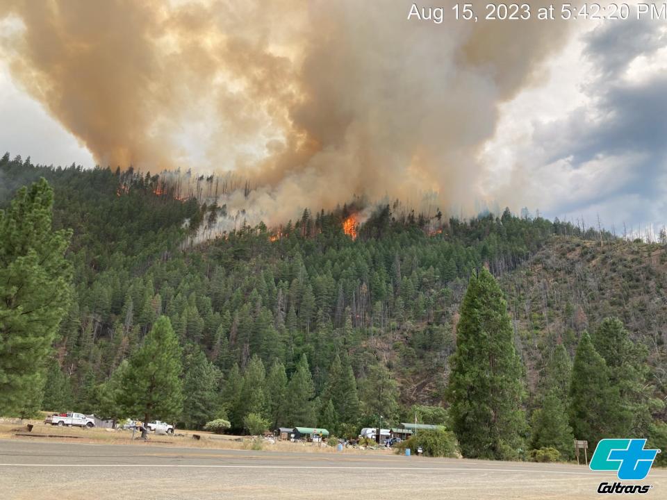 The Head Fire burns along Highway 96 in Siskiyou County, west of Yreka on Tuesday, Aug. 16, 2023.