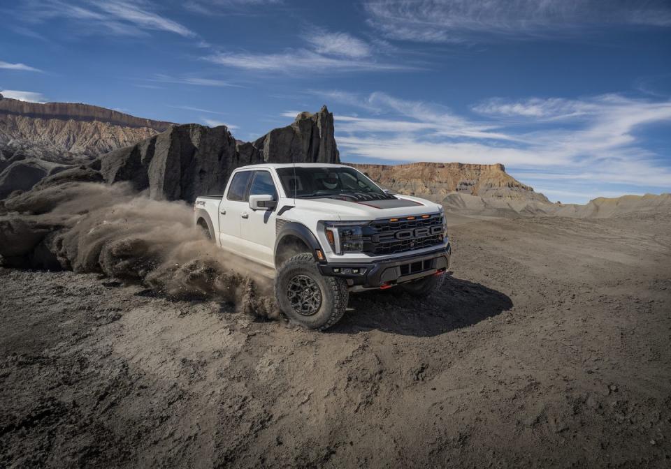 2024 ford raptor r in desert with sand spray