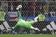 <p>Crucial save: Jordan Pickford saves a penalty from Carlos Bacca in the shoot-out. It was Colombia’s second miss and put England in the driving seat </p>