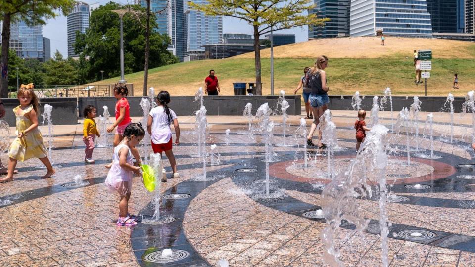 PHOTO: In this July 16, 2023, file photo, residents cool off in the Liz Carpenter Splash Pad at Butler Park, in Austin, Texas, during a heat wave. (Suzanne Cordeiro/AFP via Getty Images, FILE)