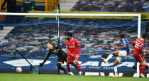 LIVERPOOL, ENGLAND - OCTOBER 17: (THE SUN OUT, THE SUN ON SUNDAY OUT )Everton's Dominic Calvert-Lewin scores the second goal making the score 2-2 during the Premier League match between Everton and Liverpool at Goodison Park on October 17, 2020 in Liverpool, England. Sporting stadiums around the UK remain under strict restrictions due to the Coronavirus Pandemic as Government social distancing laws prohibit fans inside venues resulting in games being played behind closed doors. (Photo by Andrew Powell/Liverpool FC via Getty Images)