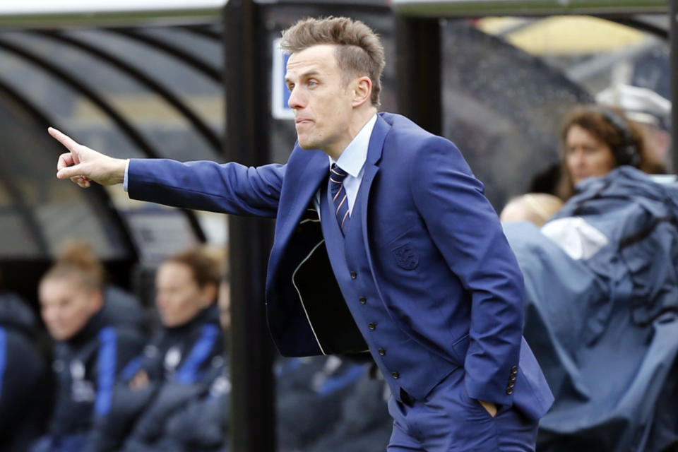 FILE - England coach Phil Neville instructs his team against France during the first half of a SheBelieves Cup women's soccer match in Columbus, Ohio, in this Thursday, March 1, 2018, file photo. David Beckham bristled when asked whether Phil Neville’s was hired as Inter Miami coach because they’re buddies. “Of course, people are always going to turn around and say, oh, it’s because he’s your friend. It’s nothing to do with him being my friend,” Beckham said Friday, Jan. 22, 2021. (AP Photo/Jay LaPrete, FIle)