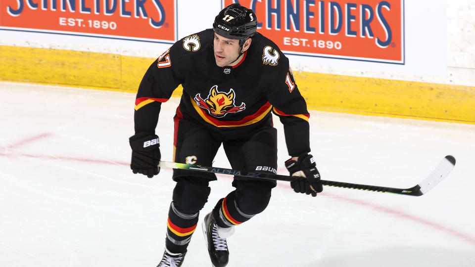 CALGARY, AB - MARCH 11: Milan Lucic #17 of the Calgary Flames skates up ice against the Montreal Canadiens at Scotiabank Saddledome on March 11, 2021 in Calgary, Alberta, Canada. (Photo by Gerry Thomas/NHLI via Getty Images)