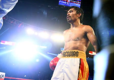 April 9, 2016; Las Vegas, NV, USA; Manny Pacquiao returns to his corner following his fight against Timothy Bradley at MGM Grand Garden Arena. Mandatory Credit: Mark J. Rebilas-USA TODAY Sports Picture Supplied by Action Images