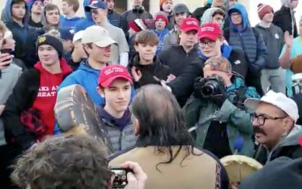 Nick Sandmann was seen in an apparent confrontation with Native American elder Nathan Philips - Survival Media Agency