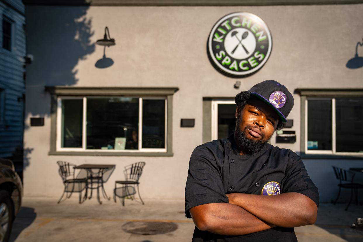 Romeo Diahn stands for a photo outside of Kitchen Spaces in the Drake neighborhood, where he is hosting Chef Tony's Culinary Delights, open only on Thursdays.