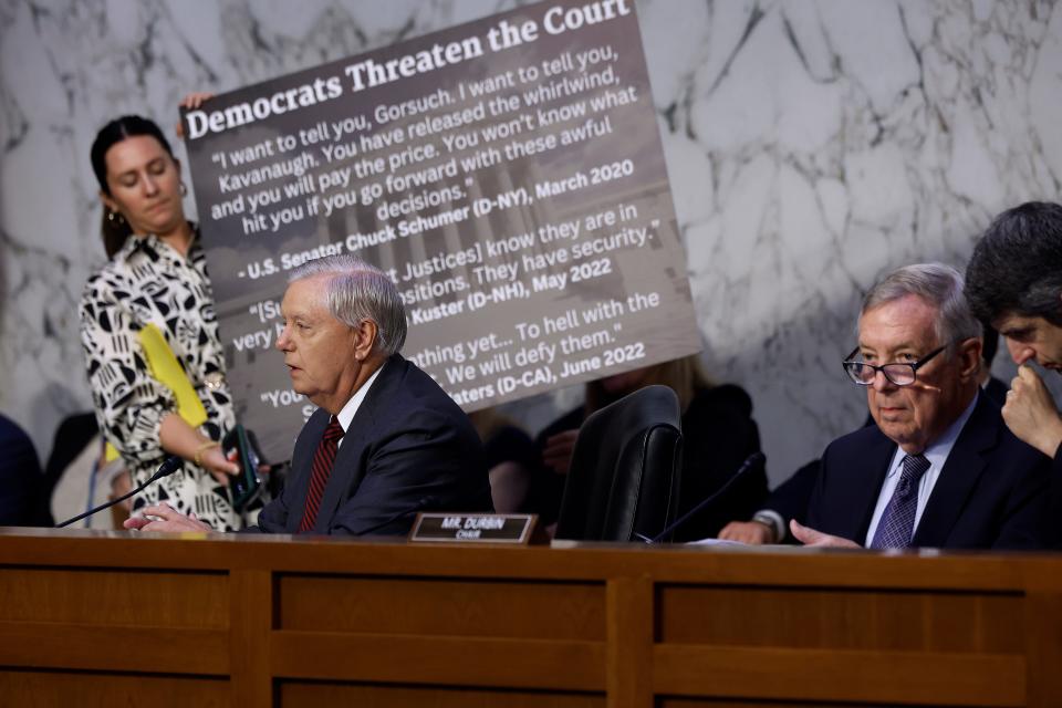 Senate Judiciary Committee ranking member Sen. Lindsey Graham (L) speaks against proposed Supreme Court ethics reform on July 20, 2023 in Washington, DC.