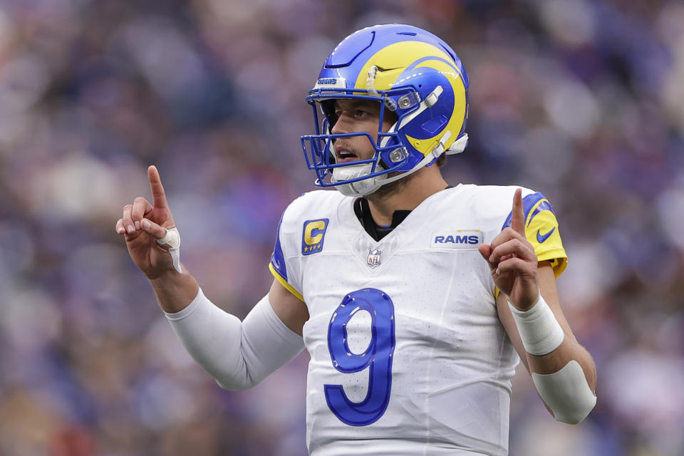 Los Angeles Rams quarterback Matthew Stafford (9) calls out to his teammates in the first half of an NFL football game against the New York Giants, Sunday, Dec. 31, 2023, in East Rutherford, N.J. (AP Photo/Adam Hunger)