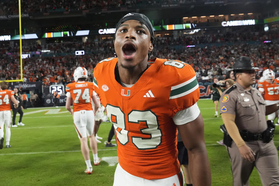 Virginia Tech wide receiver Jaylin Lane (83) celebrates after defeating Virginia Tech at an NCAA college football game, Friday, Sept. 27, 2024, in Miami Gardens, Fla. (AP Photo/Marta Lavandier)