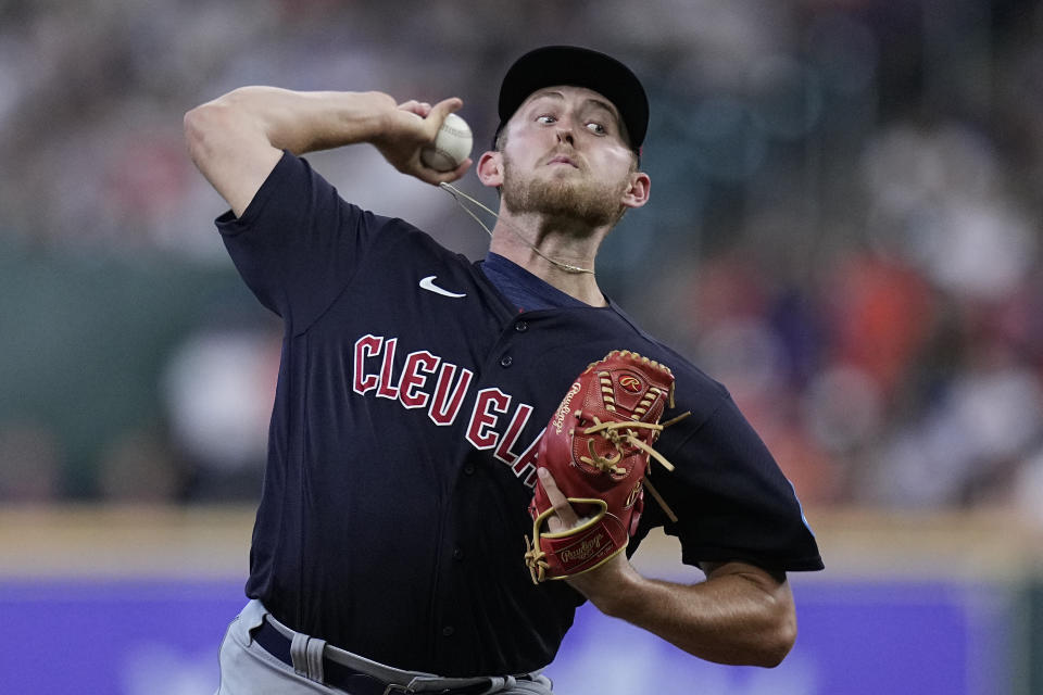 Cleveland Guardians starting pitcher Tanner Bibee delivers during the first inning of a baseball game against the Houston Astros, Wednesday, Aug. 2, 2023, in Houston. (AP Photo/Kevin M. Cox)