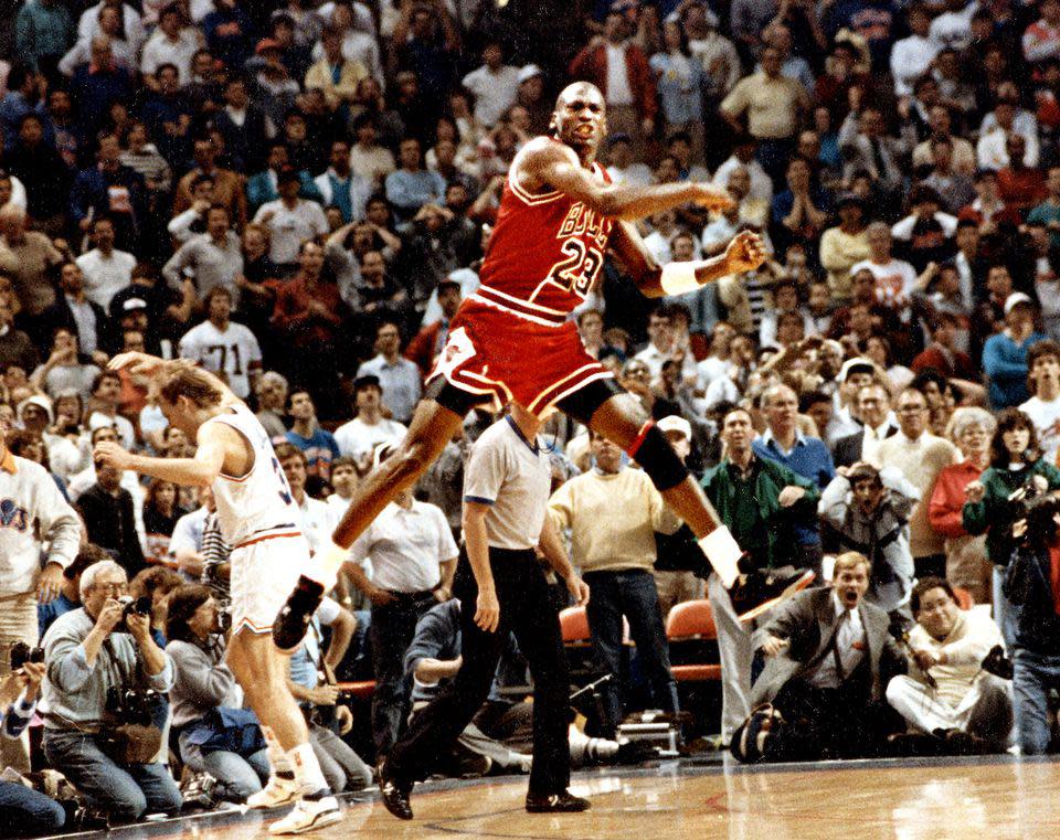 Michael Jordan reacts after hitting the game winning basket over Cleveland's Craig Ehlo in Game 5 of the NBA playoffs May 7, 1989.