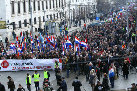 People walk during the protest against the ratification of the Istanbul Convention in Zagreb, Croatia, March 24, 2018. REUTERS/Antonio Bronic