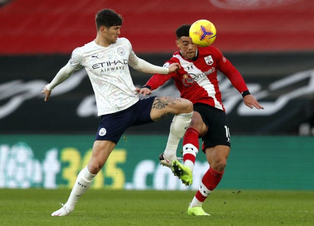 Manchester City’s John Stones and Southampton’s Che Adams (right) could come face-to-face at Wembley (