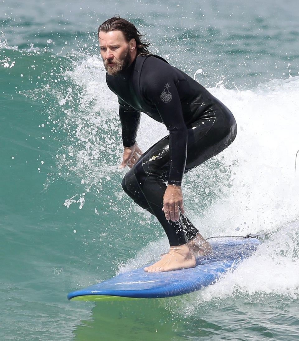 <p>Joel Edgerton hits the waves in Sydney, Australia on Tuesday.</p>