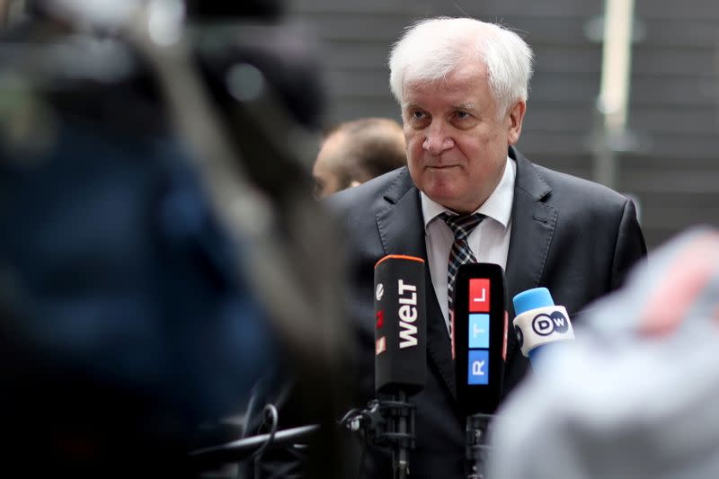 Germany's Interior Minister Horst Seehofer speaks to the media, in Berlin