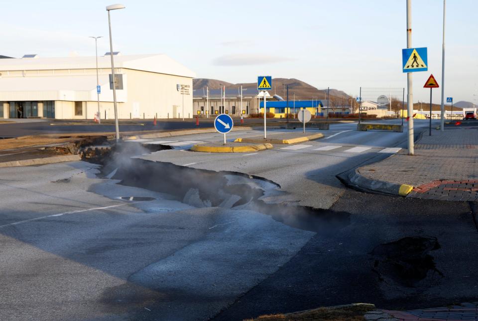 Steam rising from a crack in a road near the town of Grindavik, Iceland