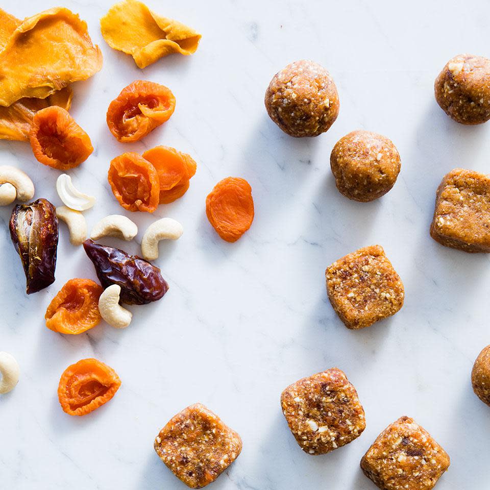 <p>Sweet, sticky dates act as the glue for these no-cook energy balls. Perfect for hikes or during sports, this healthy snack travels well. <a href="https://www.eatingwell.com/recipe/251259/mango-date-energy-bites/" rel="nofollow noopener" target="_blank" data-ylk="slk:View Recipe;elm:context_link;itc:0;sec:content-canvas" class="link ">View Recipe</a></p>