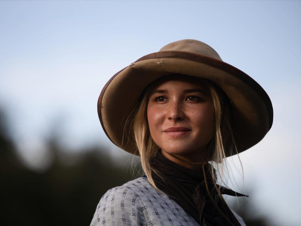 Elsa Dutton (Isabel May) returns to narrate the new "Yellowstone" origin story.