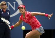 Li Na returns to Laura Robson of Great Britain during their US Open 2013 women's singles match at the USTA Billie Jean King National Center August 30, 2013 in New York. Chinese fifth seed Li Na advanced to the fourth round of the US Open on Friday, smacking 11 aces in a 6-2, 7-5 victory over British teen Laura Robson