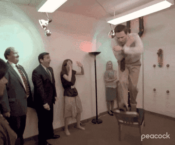 Andy coming off a chair to get into Kelly's face in "The Office."