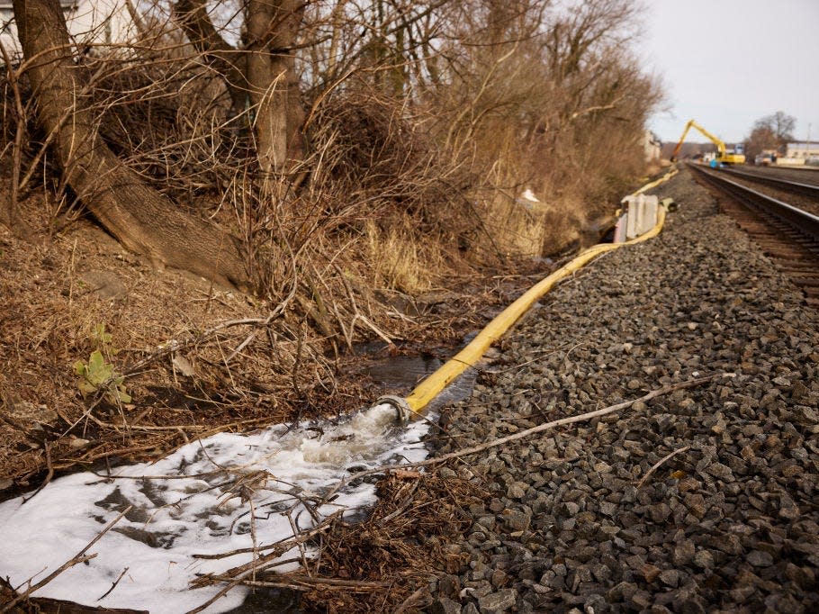 Water is rerouted near the derailment in East Palestine.